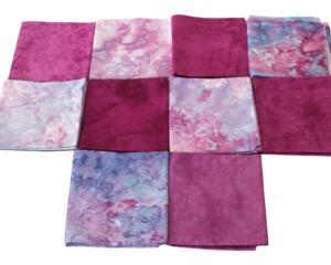 Hand dyed fat quarter bundle in shades of pink and purple